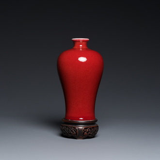 A Chinese monochrome copper-red-glazed 'meiping' vase on wooden stand, Republic