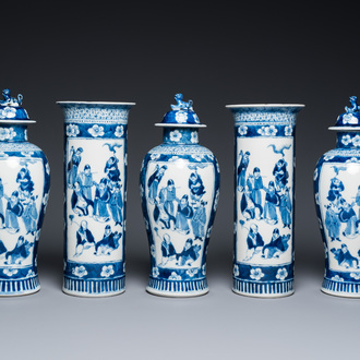 A Chinese blue and white garniture of five vases, Kangxi mark, 19th C.