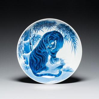 A large Japanese Arita blue and white 'tiger' dish, Fuuki Chousun 富貴長春 mark, 18/19th C.