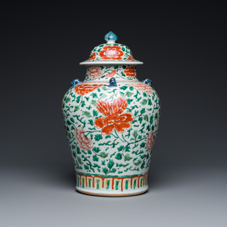 A Chinese 'peony scroll' famille verte vase and cover, Kangxi
