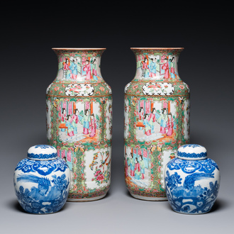 A pair of Chinese Canton famille rose vases and a pair of blue and white covered jars, 19th C.