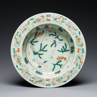 A Chinese famille rose celadon-ground 'carps' basin, 19th C.