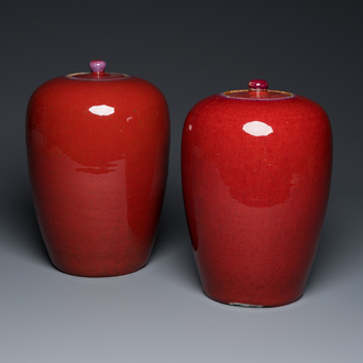 A pair of Chinese sang-de-boeuf-glazed covered jars, 19th C.