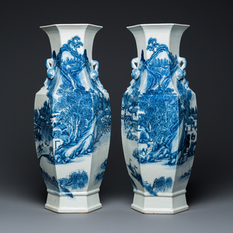 A pair of Chinese blue and white hexagonal 'mountainous landscape' vases, 19th C.