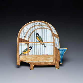 A rare polychrome Dutch Delft 'birdcage' plaque with two birds, 18th C.