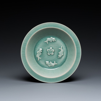 A Chinese Longquan celadon 'four carps' plate, Yuan or later