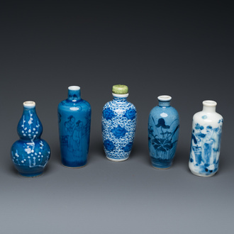 Five Chinese blue and white snuff bottles, 19th C.