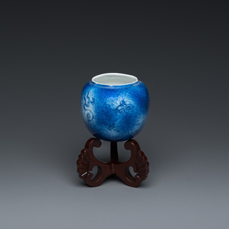 A Chinese powder-blue-glazed bird feeder with a dragon, 19th C.