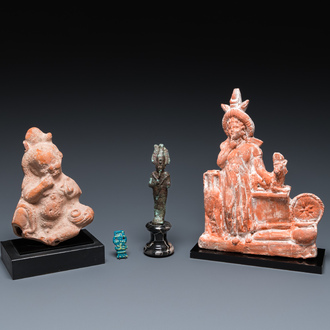 Two Egyptian terracotta sculptures, a bronze sculpture of Osiris and a turquoise frit amulet, Late period and Ptolemaic period