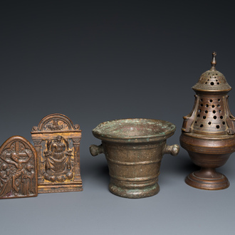 A bronze mortar, a censer and two pax of which one gilded, Western Europe, 16/17th C.