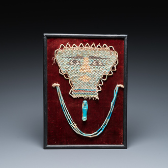 An Egyptian faience bead mummy mask, an ushabti and a necklace, Ptolemaic period