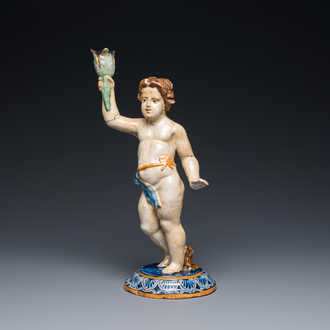 A polychrome pottery sculpture of a standing young man, Spain or France, 18/19th C.