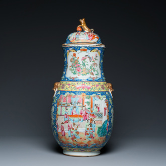 A Chinese Canton famille rose blue-ground vase and cover, 19th C.