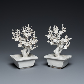 A pair of Chinese Dehua blanc de Chine trees with birds, Kangxi