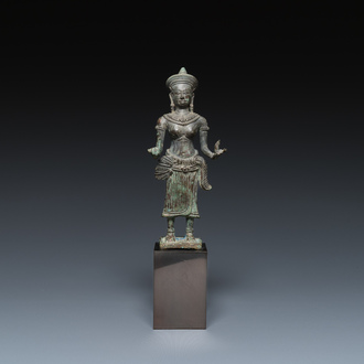 A bronze Khmer sculpture of the goddess Lakshmi, Cambodia, Angkor period, 12th C.