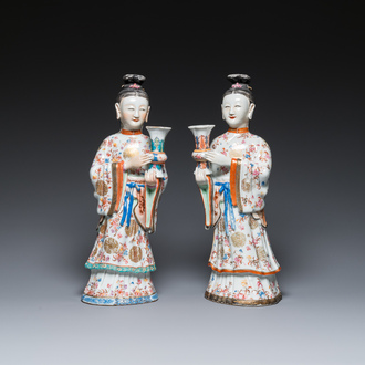 A pair of large Chinese famille rose candle holders in the shape of Mandarin court ladies, Qianlong