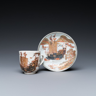 A rare Chinese gilt, grisaille and iron-red cup and saucer with a merchant vessel, Yongzheng/Qianlong