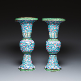 A pair of Chinese Canton enamel 'gu' vases with floral design, Qianlong