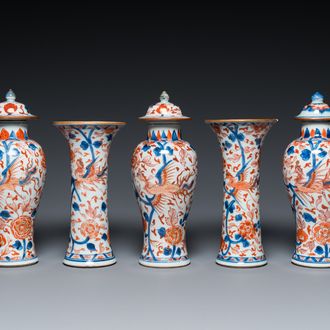 A Chinese grisaille garniture of five 'phoenix' vases, Kangxi/Yongzheng