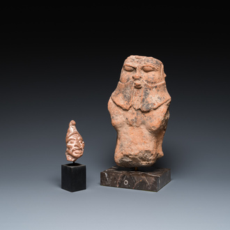 A Roman terracotta sculpture of the god Bes and a grotesque head of a male, ca. 1st C.