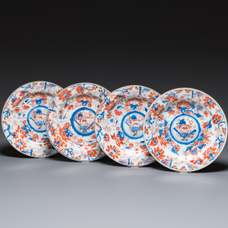 Four Chinese Imari-style plates with raised central roundels, Kangxi