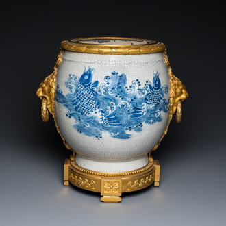 A large Chinese blue and white crackle-glazed 'carps' vase with fine gilt bronze mounts, 18/19th C.