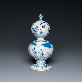 A Dutch Delft blue and white double gourd money bank with a deer hunt, dated 1732