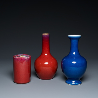 Two Chinese monochrome sang-de-boeuf and powder-blue-glazed vases and a brush pot, 18/19th C.