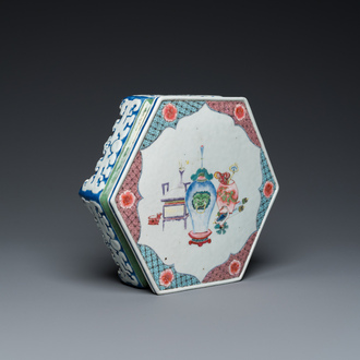 A rare Chinese famille rose hexagonal 'antiquities' stand, Yongzheng