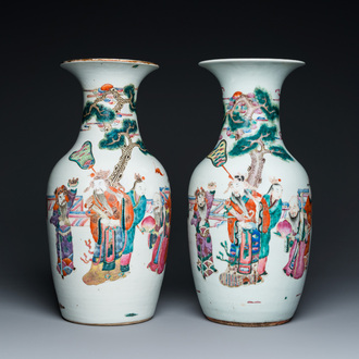 A pair of Chinese famille rose 'Sanxing' vases, 19th C.