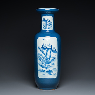 A Chinese blue-ground rouleau vase with blue and white landscape panels, 19th C.