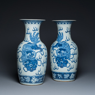 A pair of Chinese blue and white 'Buddhist lion' vases, 19th C.