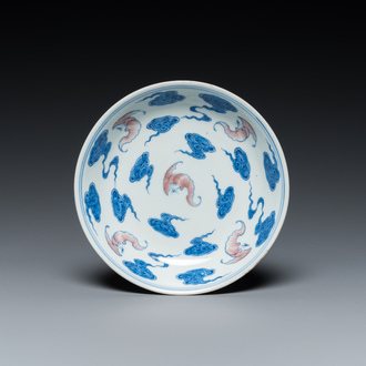 A Chinese blue, white and copper-red 'Bats and clouds' plate, Qianlong mark but probably later