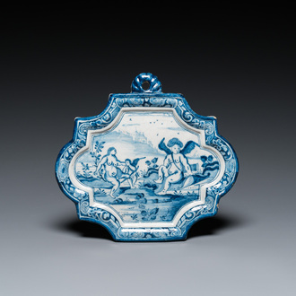 A Dutch Delft blue and white plaque depicting Amor and Psyche, 18th C.