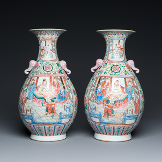 A pair of Chinese famille rose vases with elephant handles, 19th C.