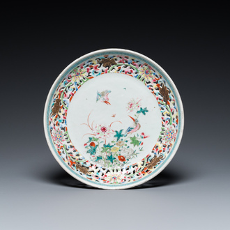 A Chinese famille rose 'kingfishers' dish with reticulated rim, Yongzheng/Qianlong