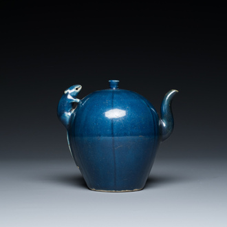 A Chinese blue-glazed teapot with a rat-shaped handle, Transitional period