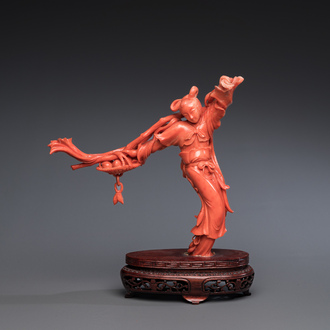 A Chinese red coral sculpture of the immortal Lan Caihe, 19/20th C.