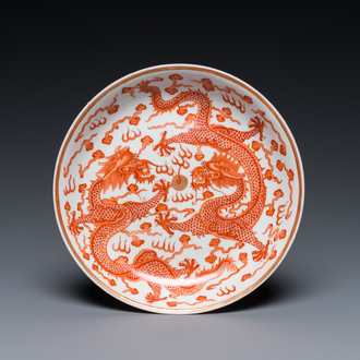 A Chinese iron red 'dragon' plate, Xuantong mark and probably of the period