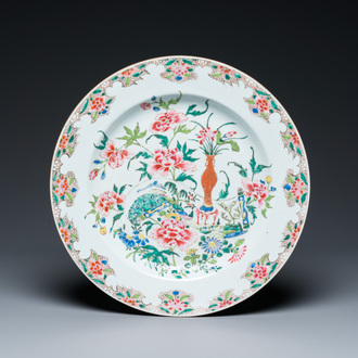 A Chinese famille rose 'antiquities' dish, Qianlong