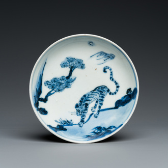 A Chinese blue and white ko-sometsuke 'tiger' dish for the Japanese market, Tianqi/Chongzhen