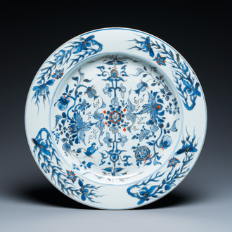 A Chinese blue and white dish with applied gilt and iron-red accents, Yongzheng