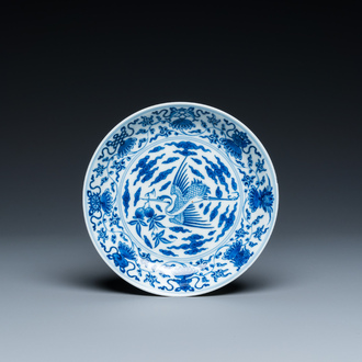 A Chinese blue and white 'crane' saucer dish, Yongzheng mark, 18/19th C.