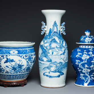 A Chinese blue and white 'landscape' vase, a covered vase and a jardinière, 19th C.