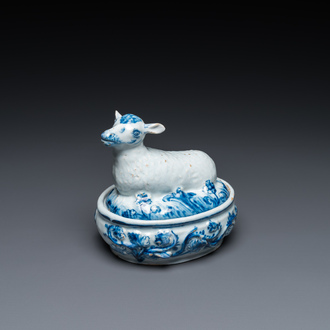 A Dutch Delft blue and white butter tub with a lamb, 18th C.