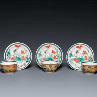 Three Chinese Kangxi-style café-au-lait-ground famille verte cups and saucers, rabbit mark, 19th C.