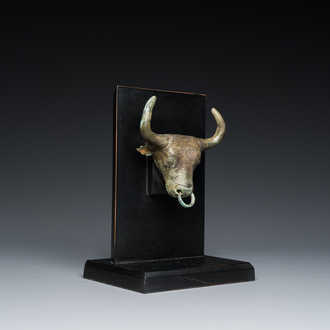 A Chinese bronze buffalo head ornament, Warring States Period