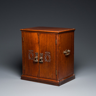 A Chinese huanghuali and hardwood cabinet with bronze fittings for the European market, 19th C.