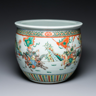 A Chinese famille verte fish bowl with warriors on horseback, 19th C.