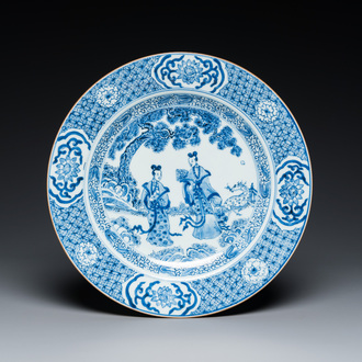 A Chinese blue and white dish with two ladies in a garden, Yonzgheng